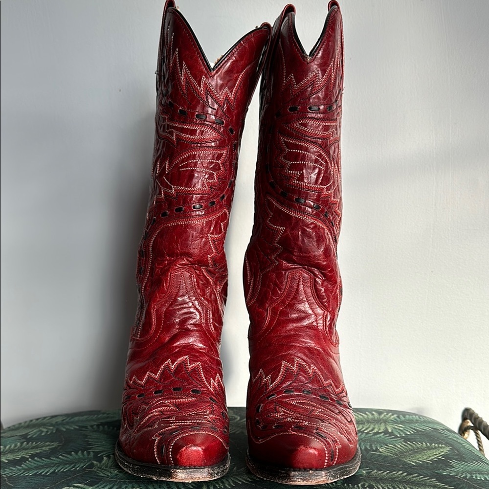 Red Heeled Boots with Intricate Stitching